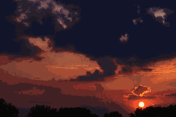 orange sunset and dark clouds