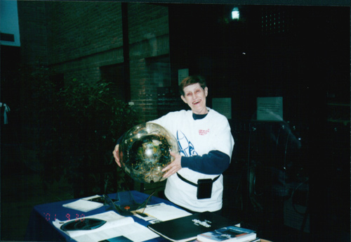 Lorna Simmons with a celestial globe.